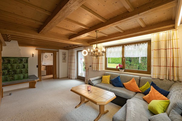 Living area with tiled stove